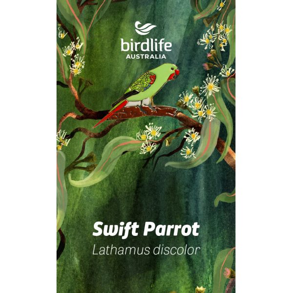 An enamel Swift Parrot pin affixed to a backing card, featuring eucalyptus leaves and blossom.