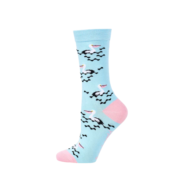 A pale blue sock with a pink heel and toe, featuring images of pelicans swimming.